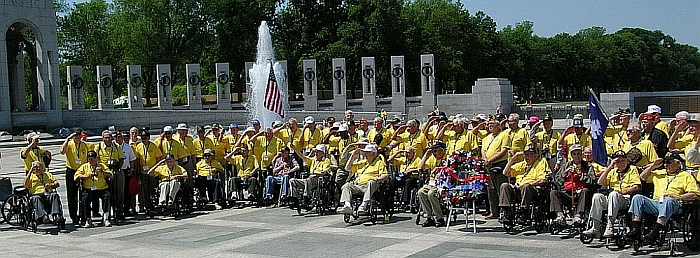Upstate veterans saluting as Taps is played beneath the pillars of the WWII Memorial, May 7, 2008.