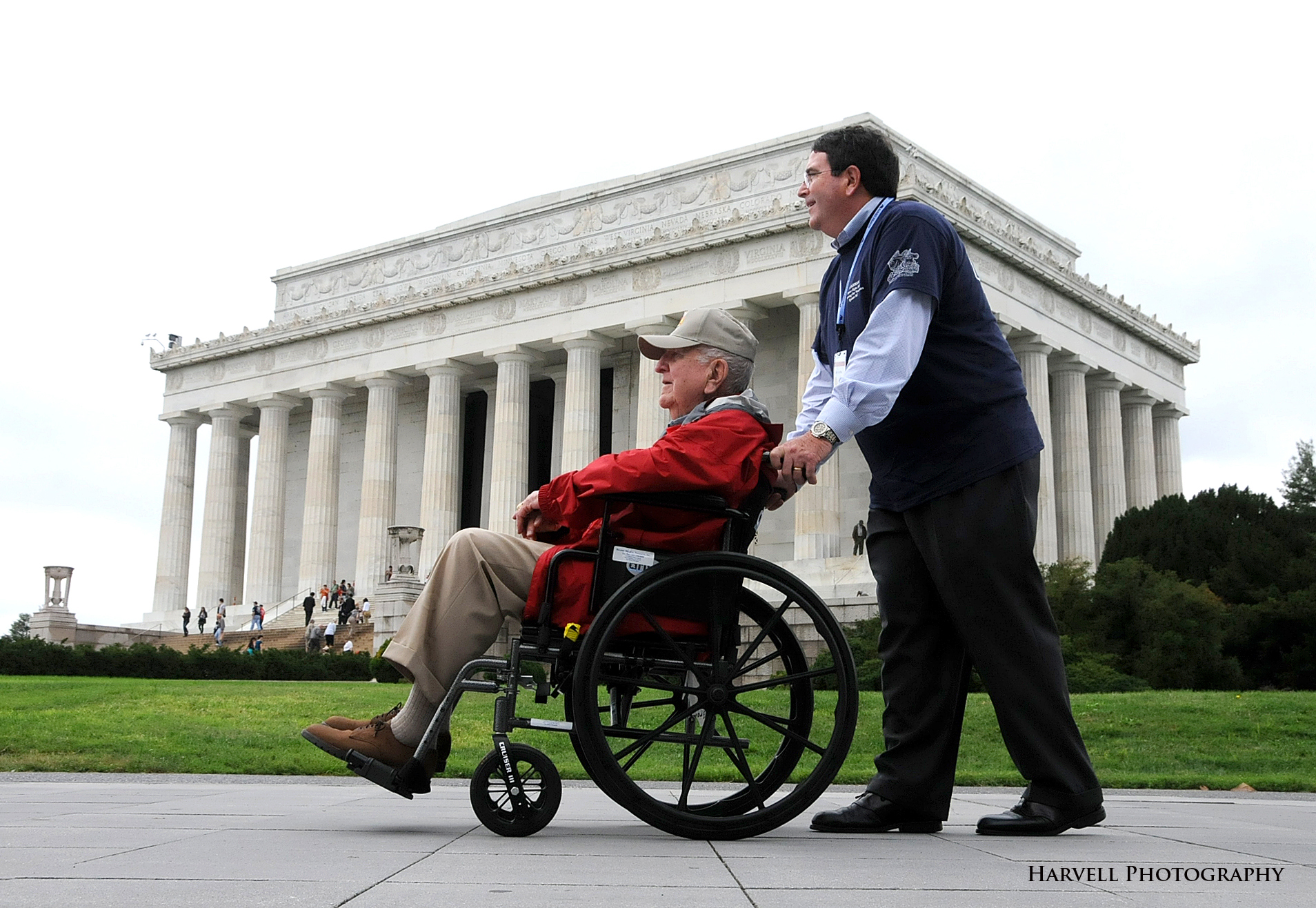 A veteran in a wheelchair reflects at the Lincoln Memorial in Washington, D.C.