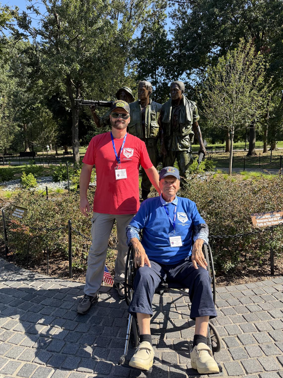 Bill Quinton with his guardian at a Washington, D.C. memorial